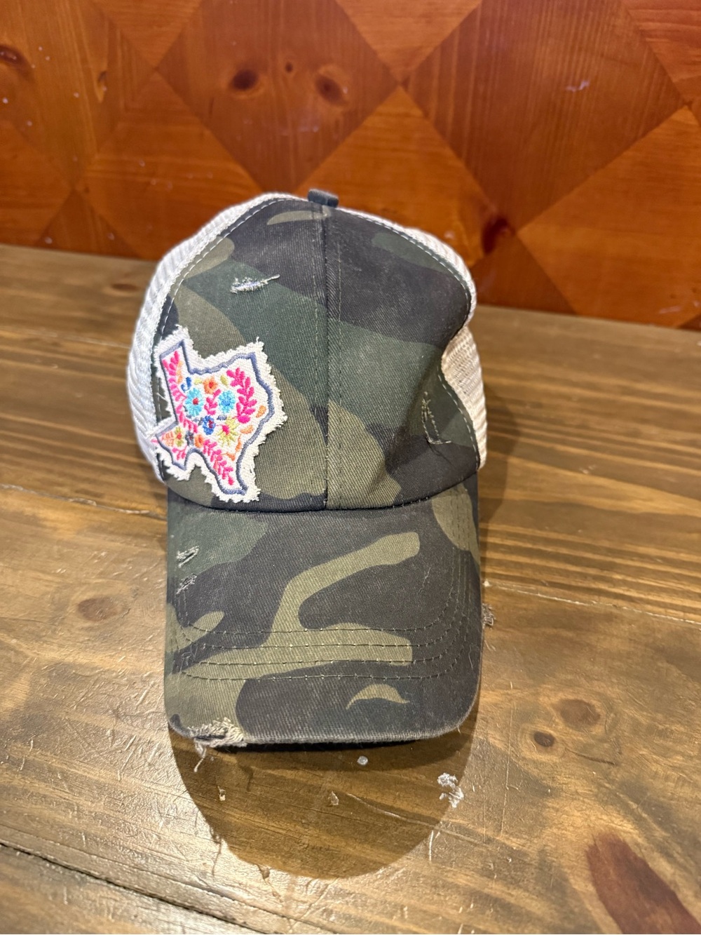 Camo trucker hat with TX patch